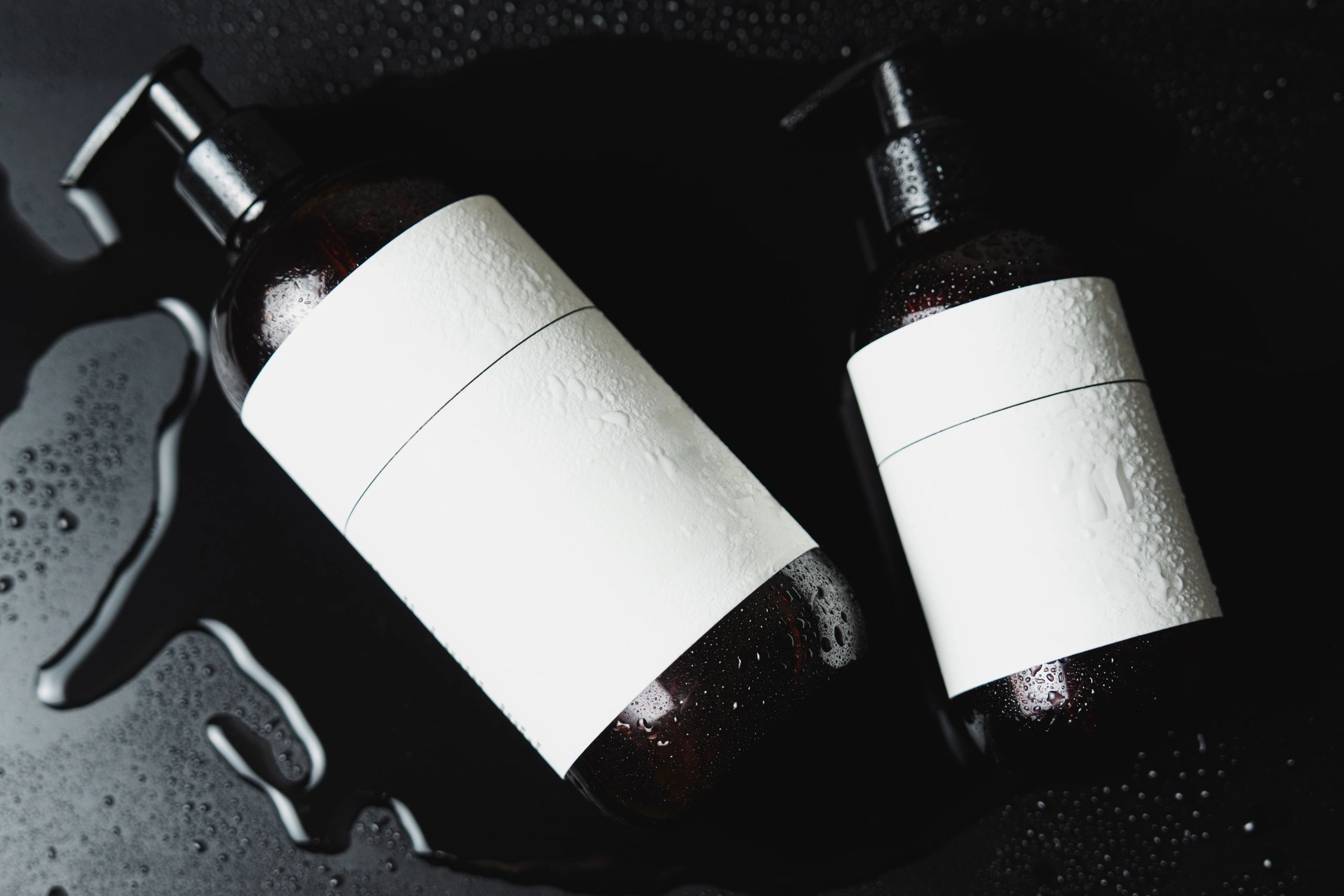 Cosmetic bottles representing client brand outcomes